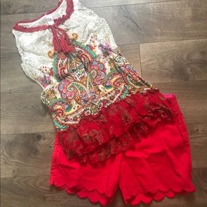 Sleeveless shorts outfit.